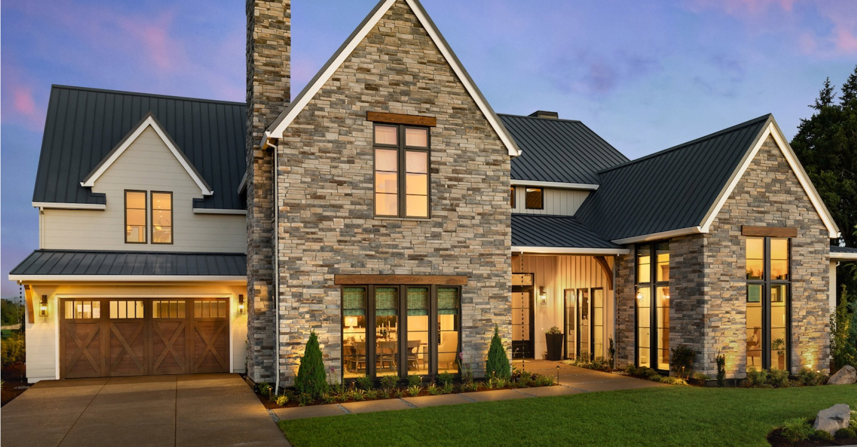 A mix of stone siding and wood siding give this home unique personality. From Mead Lumber